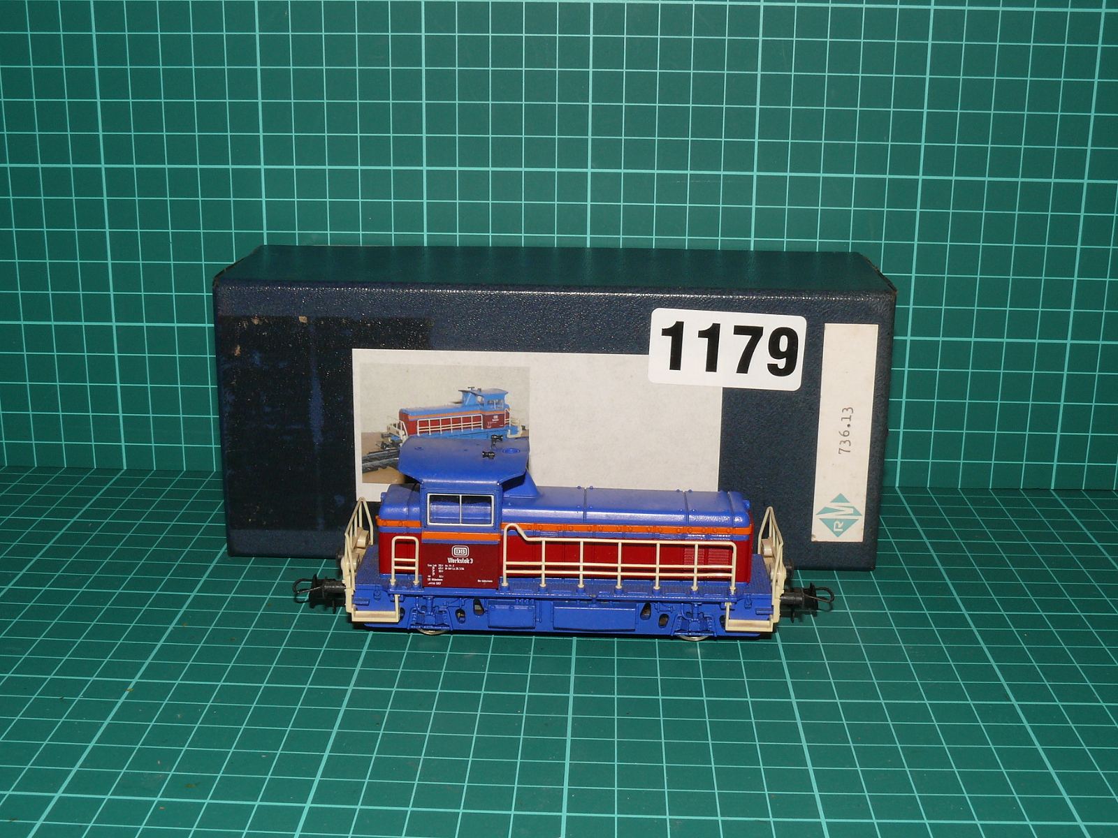 Roco H0 - Dvounápravová posunovací dieselová lokomotiva „Werkllok 3“ DB, modro-červená s krabičkou (1:87) – H0