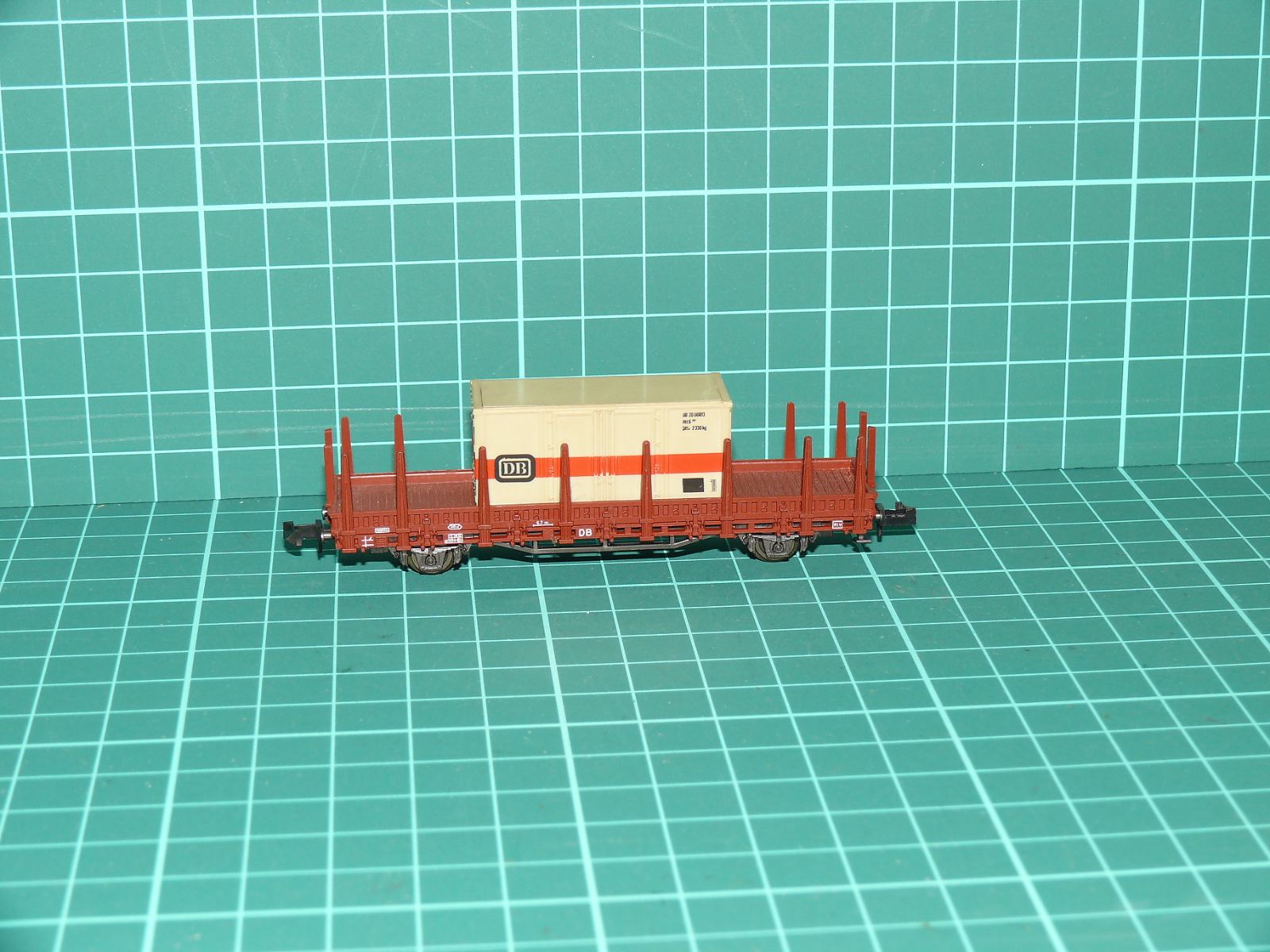 Roco N - Dvounápravový klanicový vůz Kbs s kontejnerem DB „Von Haus zu Haus“ (1:160) – N