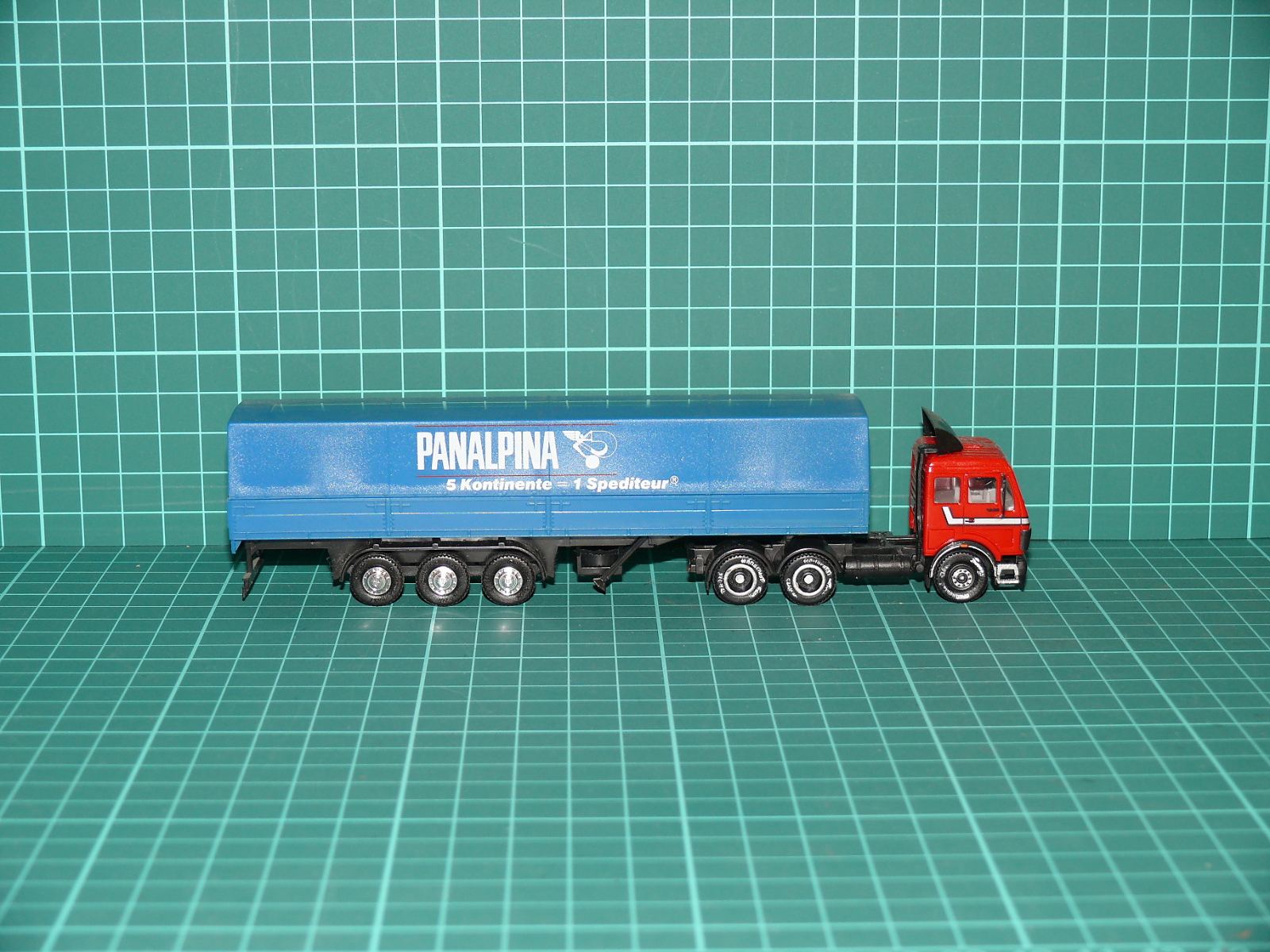 Herpa - Mercedes-Benz NG Návěsová plachtová souprava „PANALPINA“ – H0