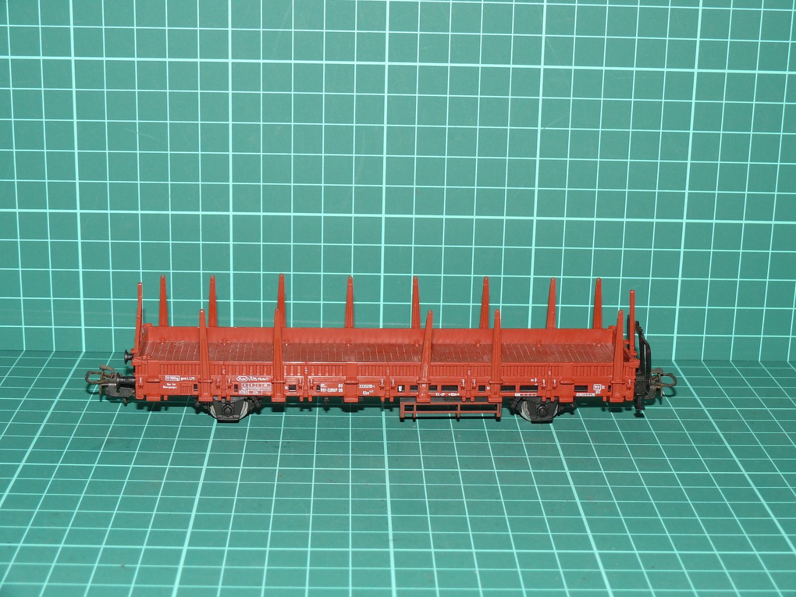 Märklin H0 – Dvounápravový klanicový plošinový vůz Rlmms DB (hnědý, Ep. IV) – H0