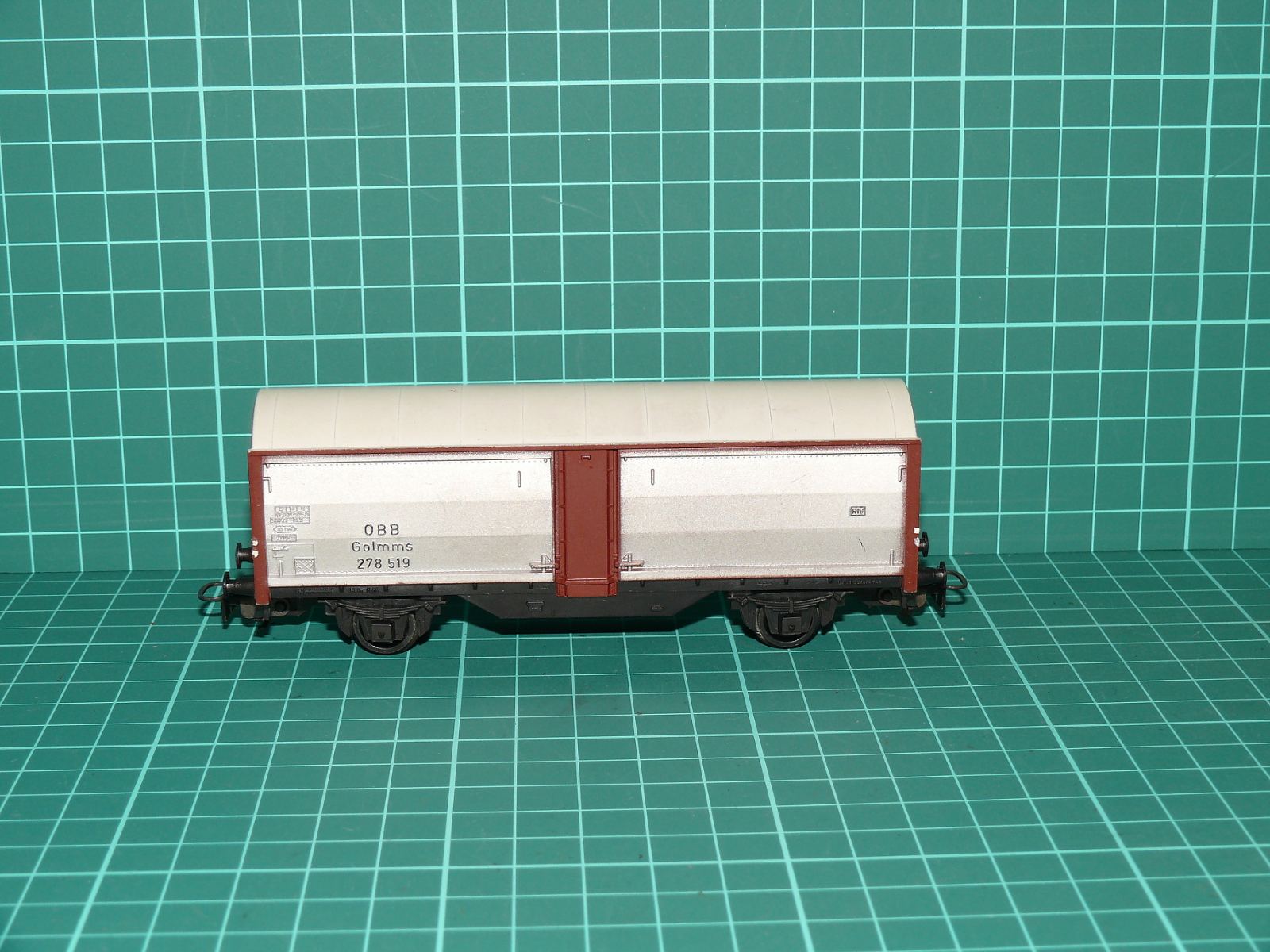 Kleinbahn H0 – Dvounápravový nákladní vůz s posuvnými stěnami Gglmms ÖBB (278 519) – H0