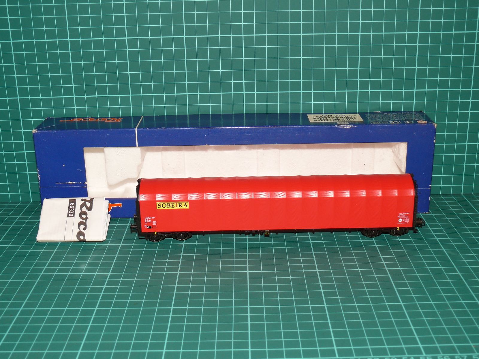 Roco H0 – Čtyřnápravový plachtový vůz Rils "SOBETRA" SNCB/NMBS (66320) – H0