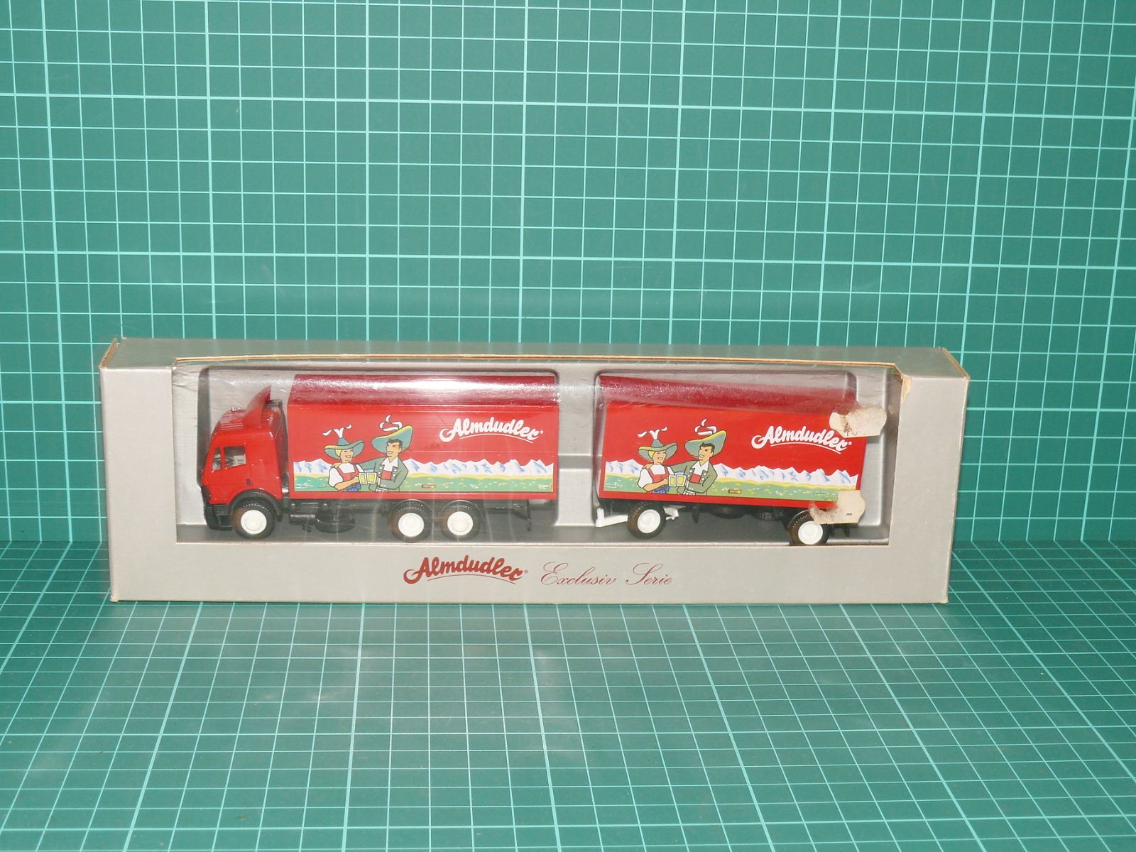 HERPA H0 – Kamionová souprava s přívěsem MAN F90 „ALMDUDLER – Exclusiv Serie“ (1:87, OVP) – H0