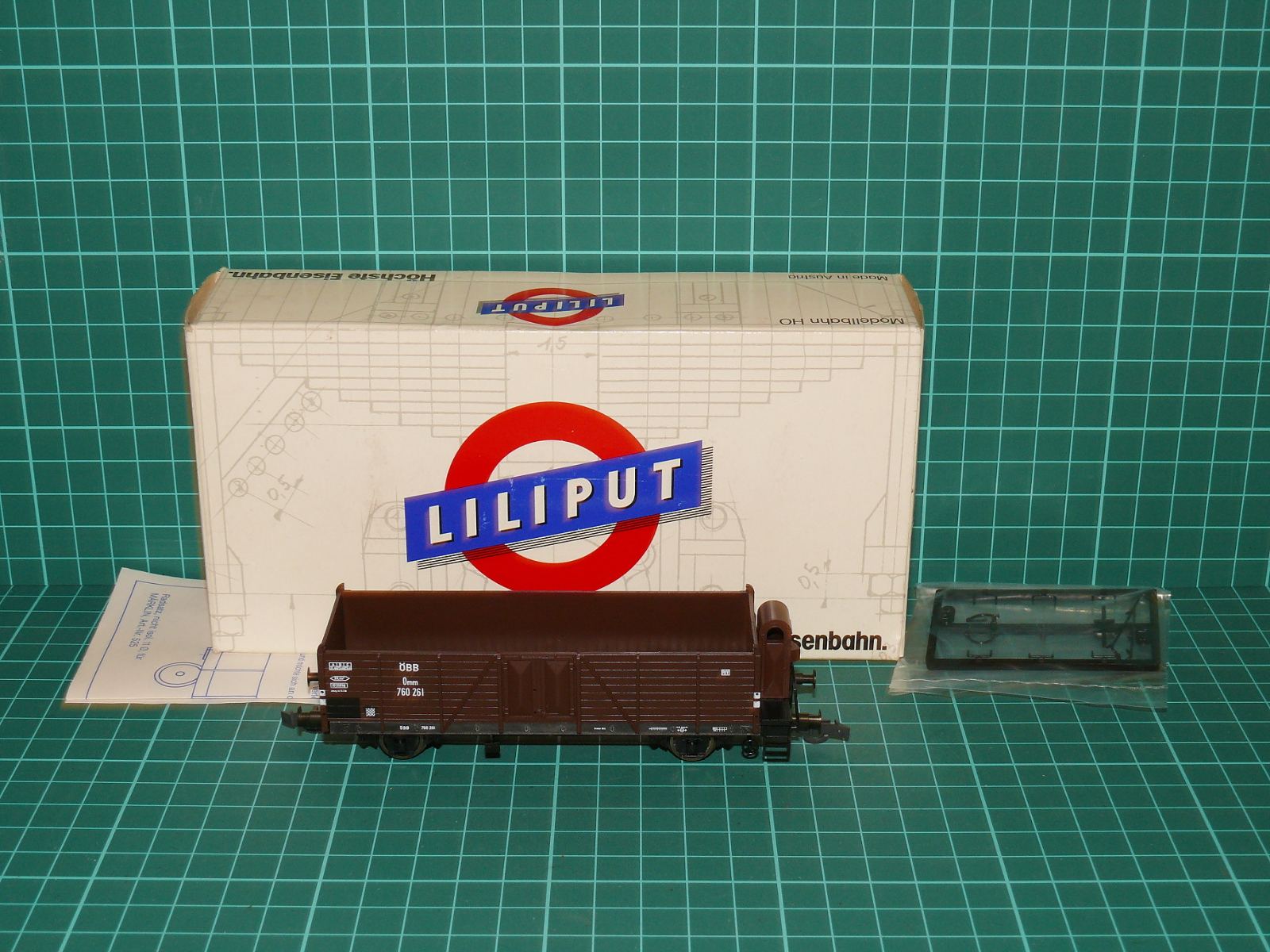 Liliput H0 – Otevřený vysokostěnný vůz s budkou řady Omm ÖBB (kat. č. 217 14, OVP) – H0