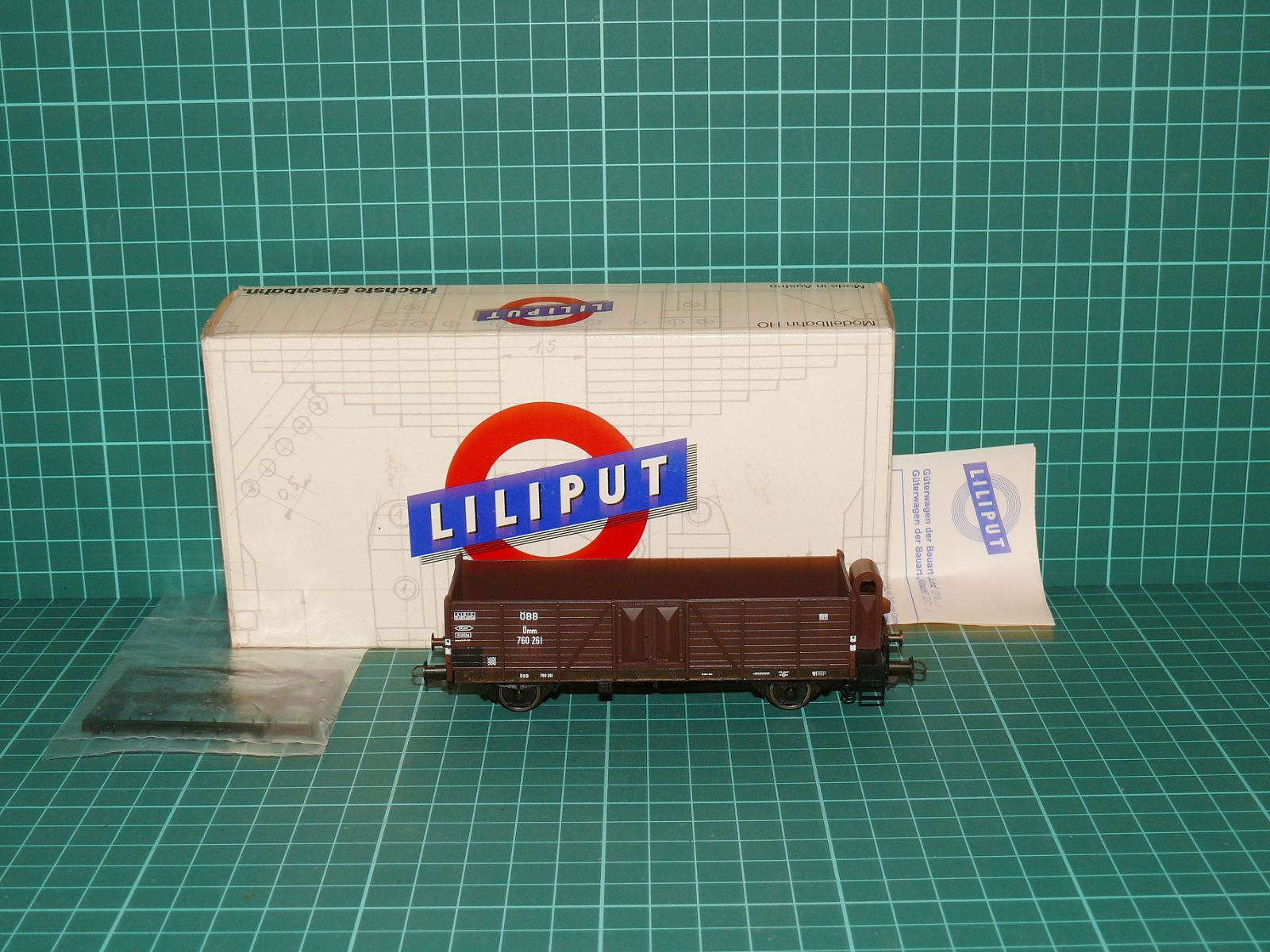 Liliput H0 – Otevřený vysokostěnný vůz s budkou řady Omm ÖBB (kat. č. 217 14, OVP) – H0