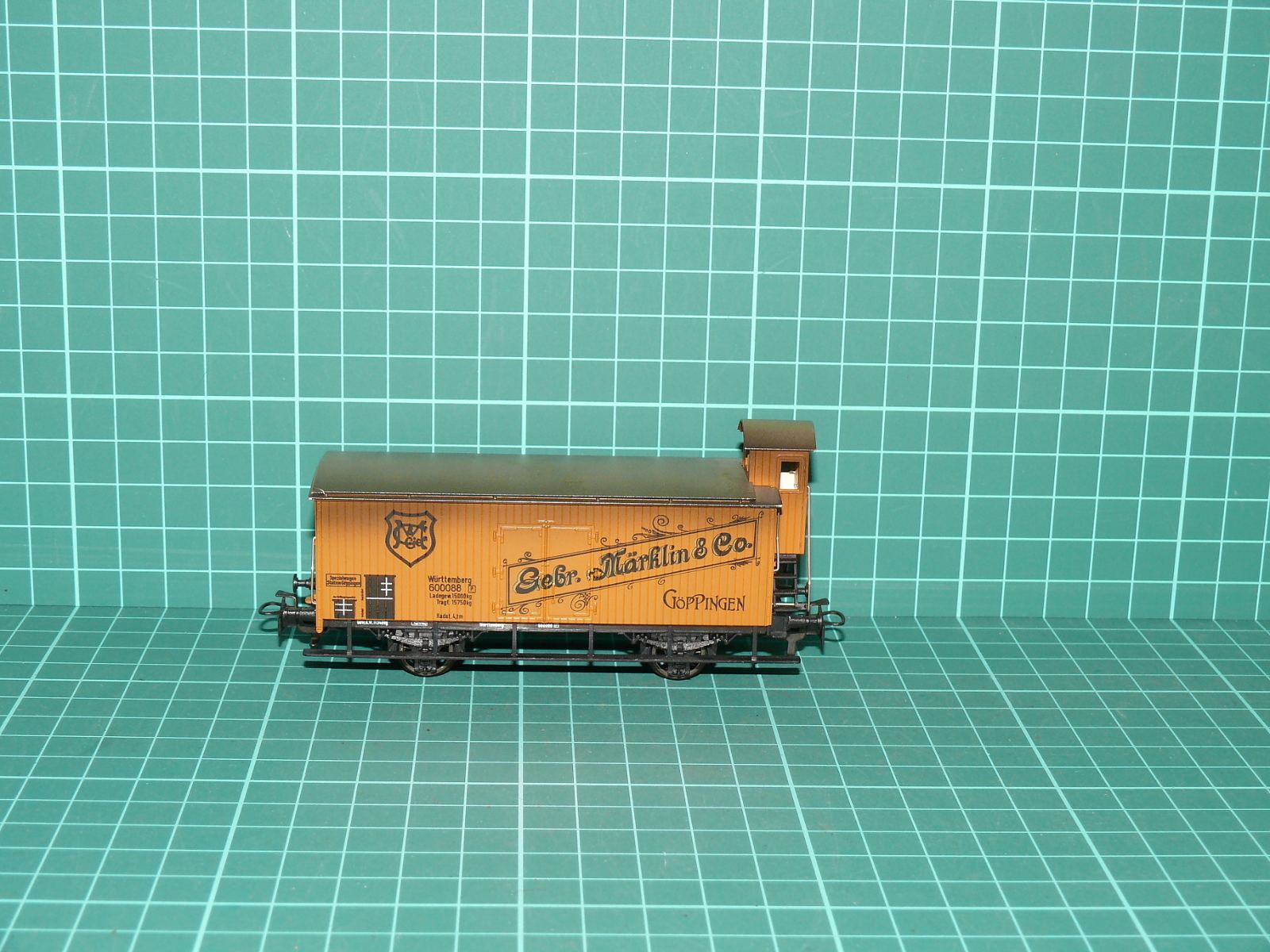 MÄRKLIN H0 – Dvounápravový krytý muzejní vůz s budkou „Gebr. Märklin & Co. Göppingen“ K.W.St.E. (Museumswagen 1987 / kat. č. 84887 / 4887) – H0