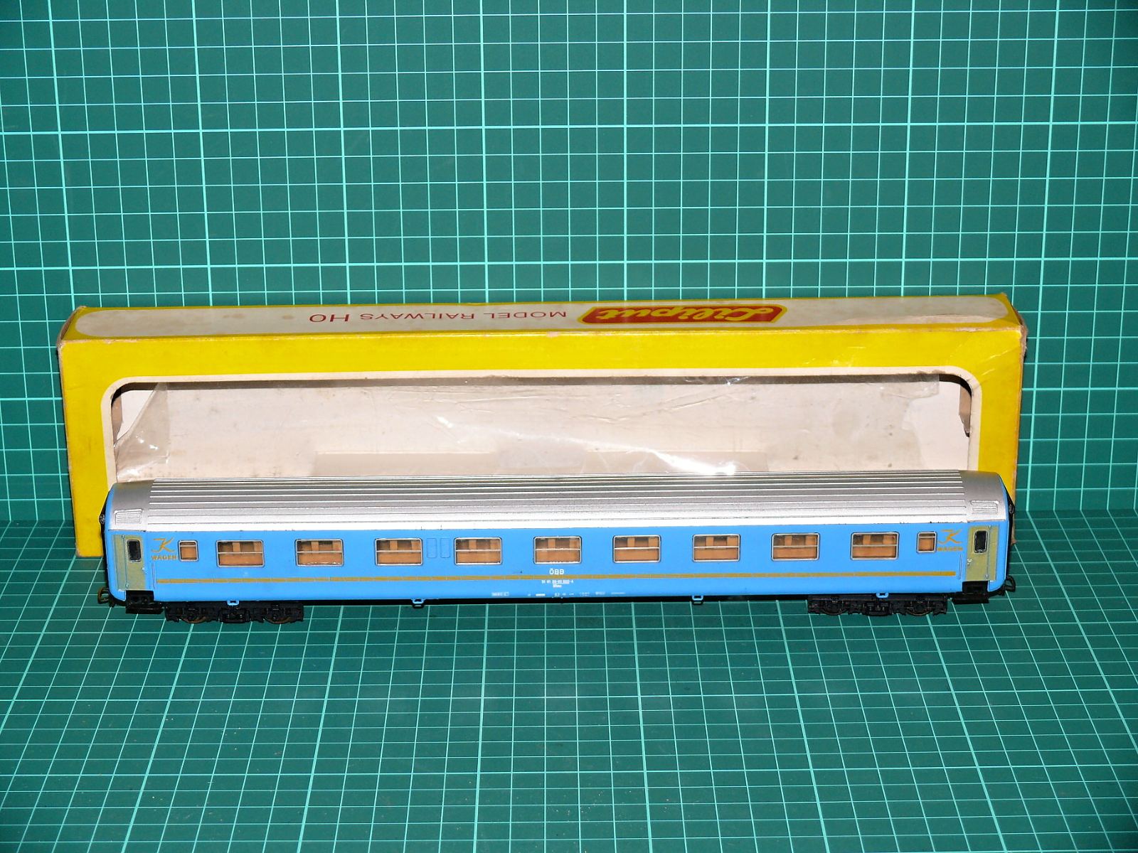Liliput 296 H0 - Čtyřnápravový rychlíkový lůžkový vůz K-Wagen WLAB (ÖBB) modro-stříbrný s krabičkou (1:87) – H0
