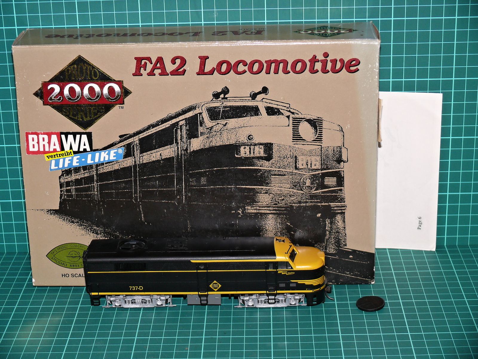 Proto 2000 / Life-Like (Brawa) 8348 H0 - Motorová lokomotiva ALCO FA-2 „ERIE“ (737-D, bezmotorová / Dummy) s krabičkou (1:87) – H0