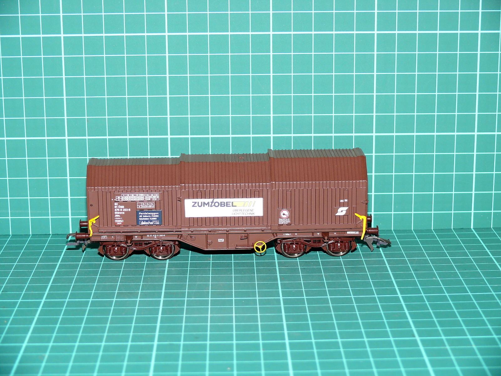 Roco H0 - Čtyřnápravový teleskopický vůz na svitky Shimms „ZUMTOBEL“ ÖBB hnědý (1:87) – H0