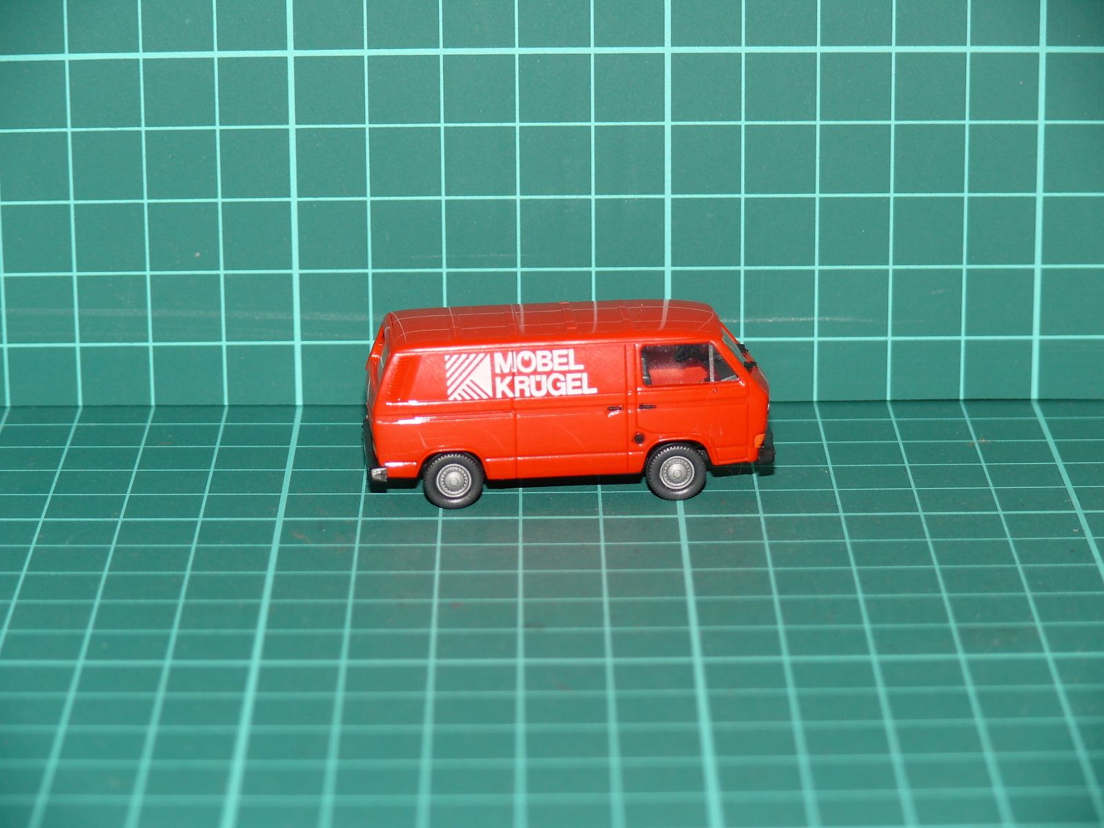 Roco H0 – Volkswagen VW T3 Kasten „MÖBEL KRÜGEL“, červená (1:87) – H0