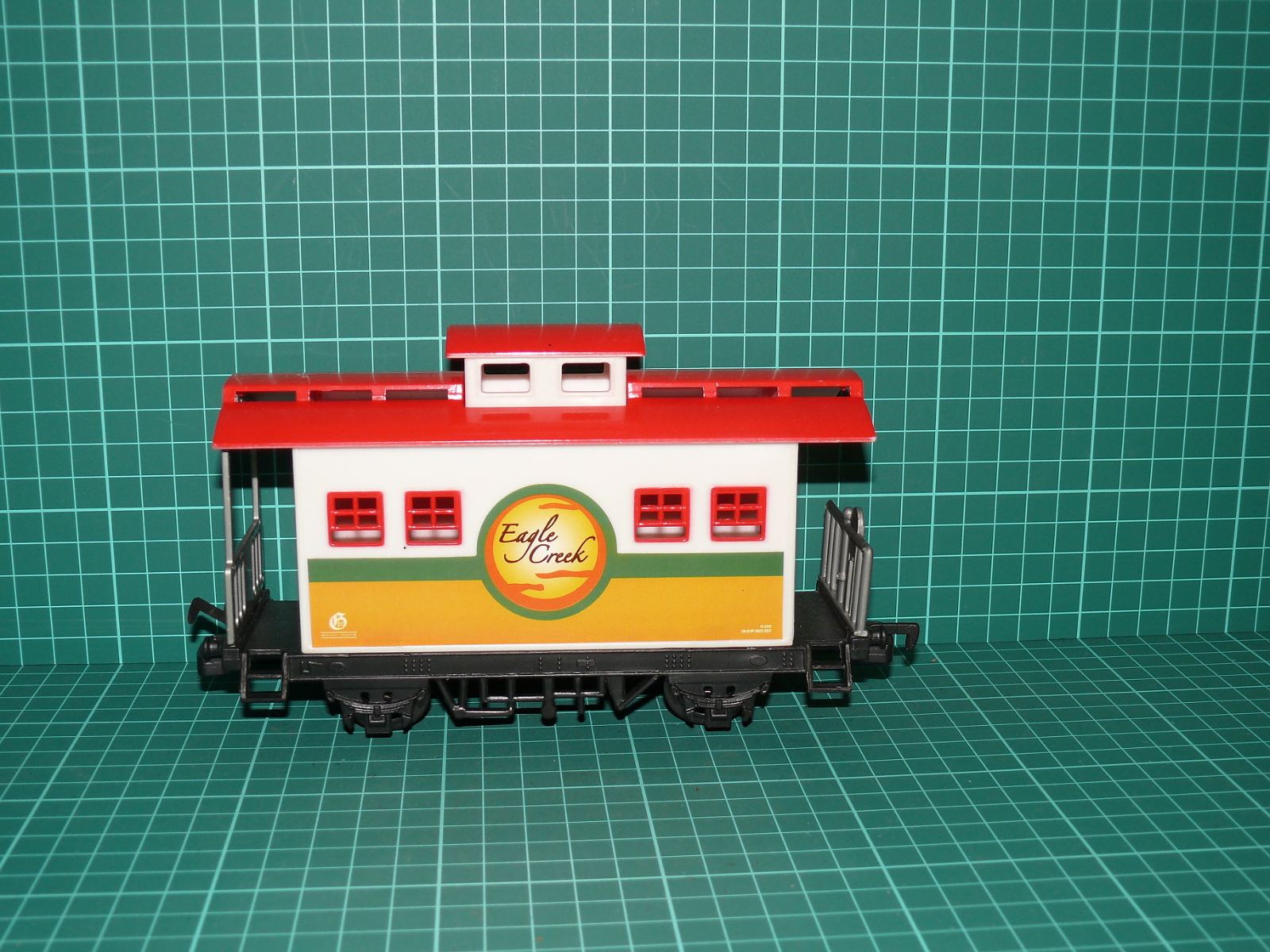 Americký služební vůz konce vlaku (Caboose) „Eagle Creek“ – Velikost 0 (1:45, rozchod 32 mm) – Jiné velikosti