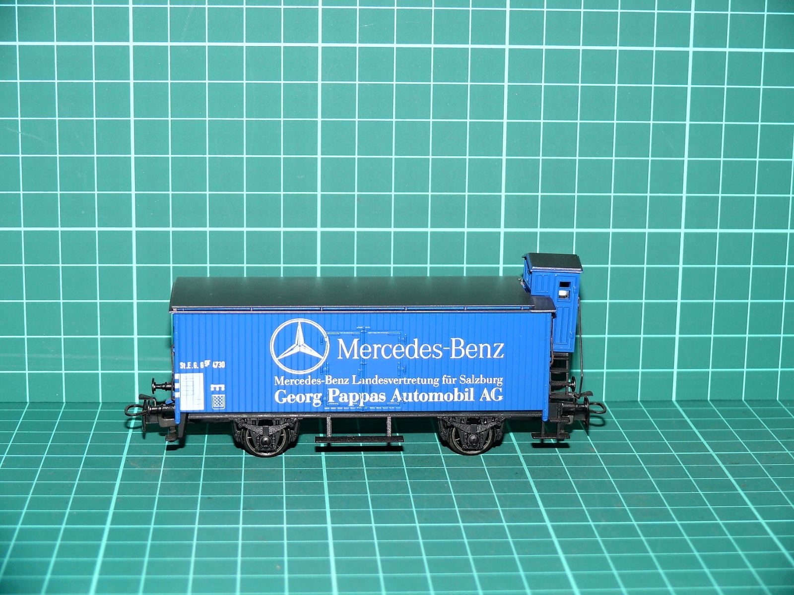 Märklin - Krytý nákladní vůz Mercedes-Benz Georg Pappas s brzdařskou budkou – H0