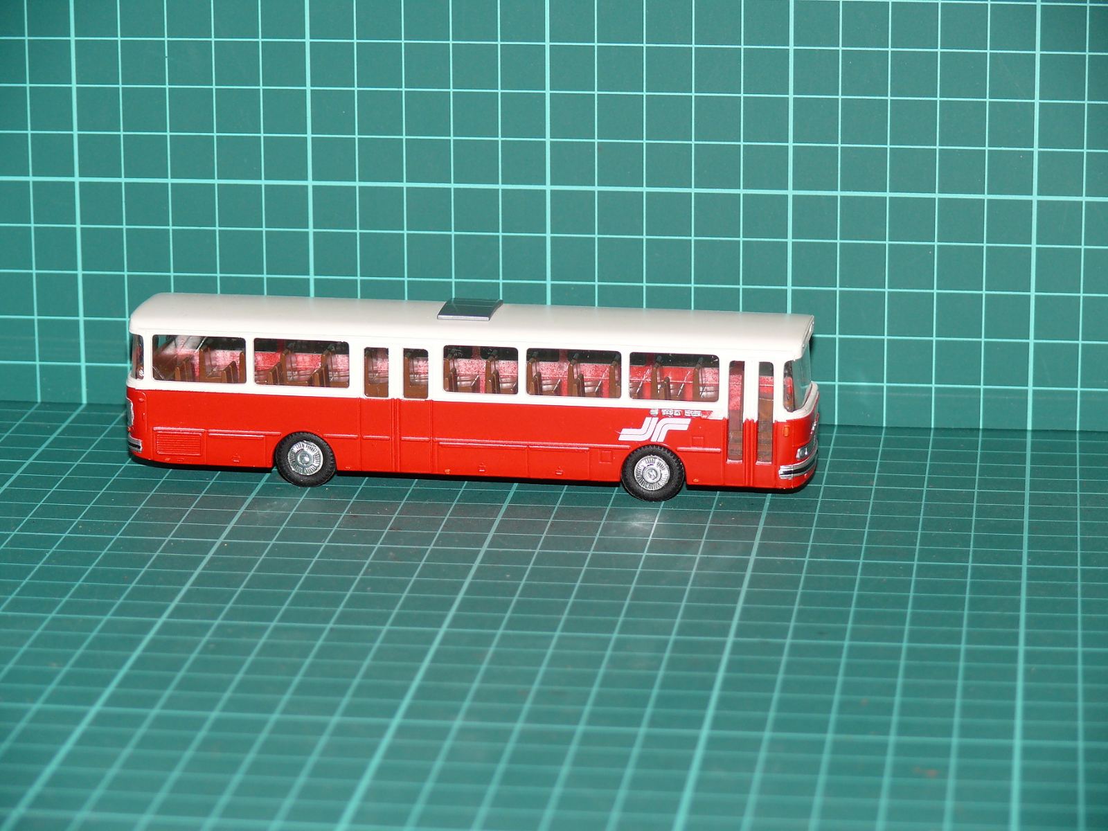 I.M.U. H0 – Linkový autobus Kässbohrer Setra S 140 ES „J/R“ v červeno-bílém laku – H0