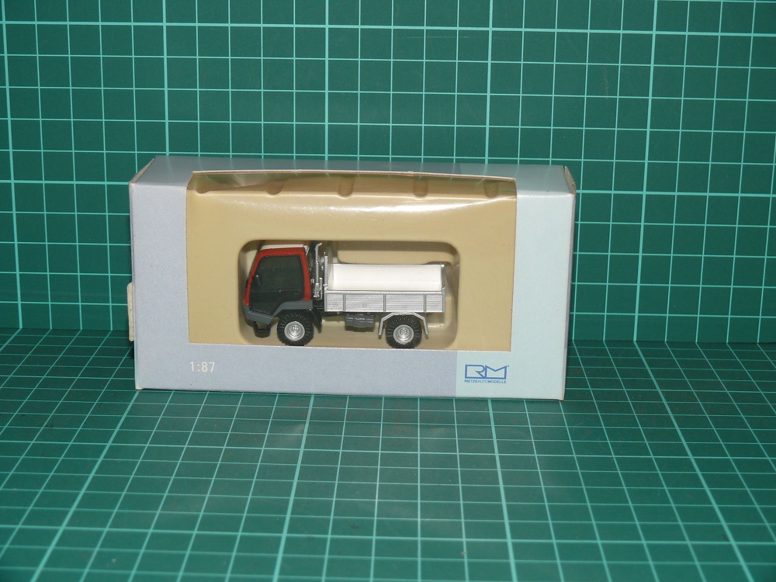 Rietze / RIBU H0 (1:87) – Lindner Unitrac 92 terénní komunální valník v originální krabičce (kat. č. 82000) – H0